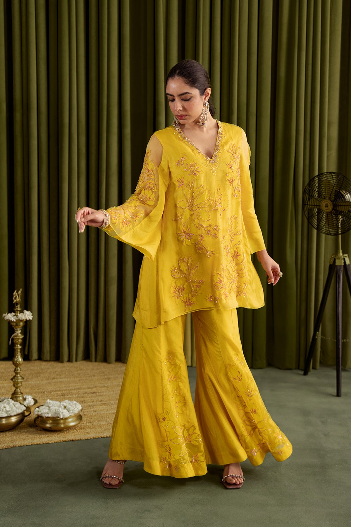 Mango sharara set with embroidered magnolia flower pattern.