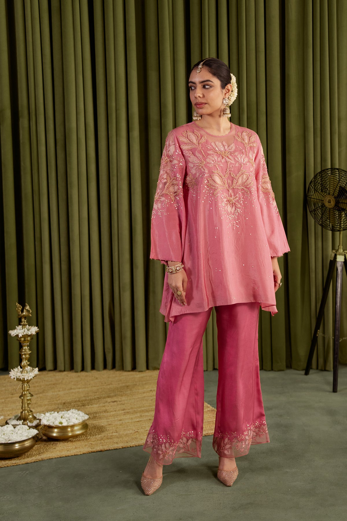 Rose pink co-ord set with embroidered magnolia flower pattern.