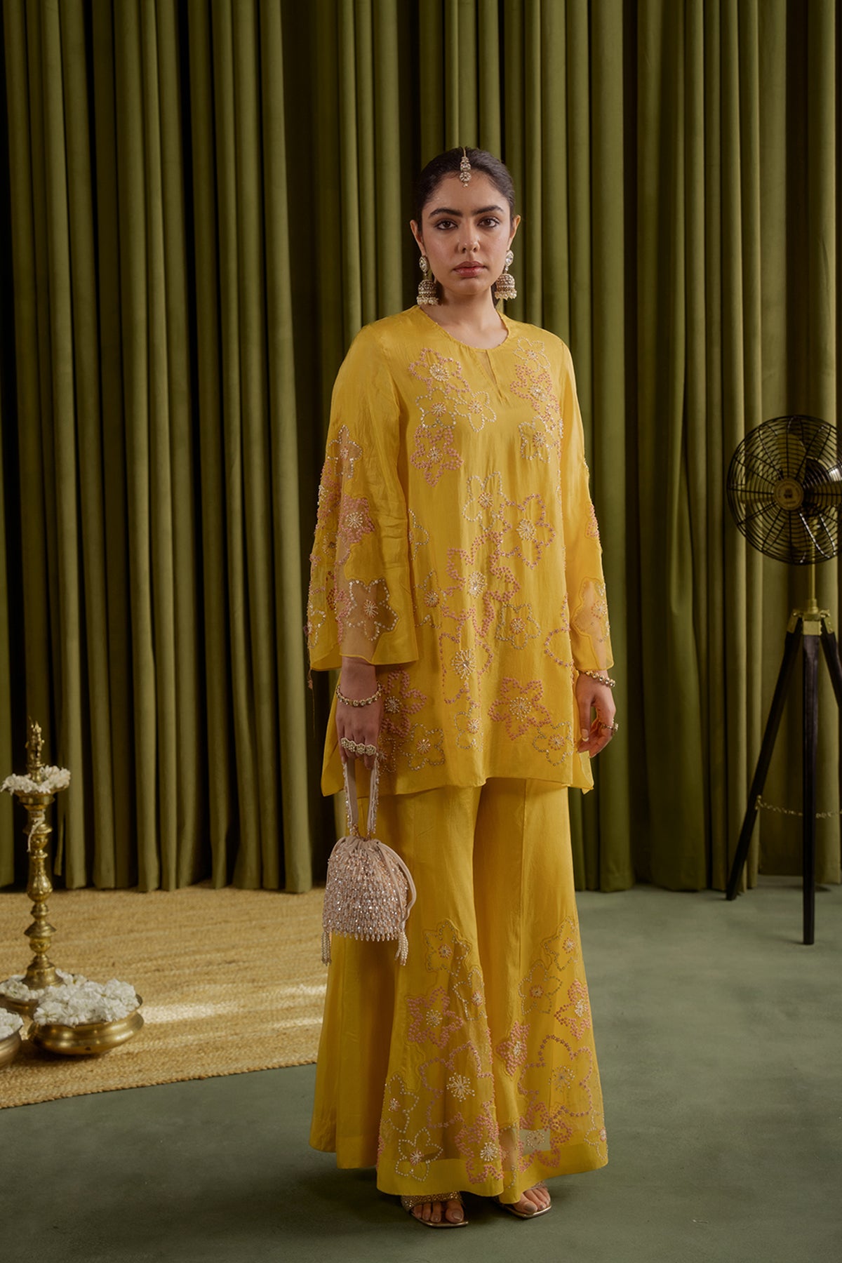 Mango sharara set with hand embroidered floral pattern.