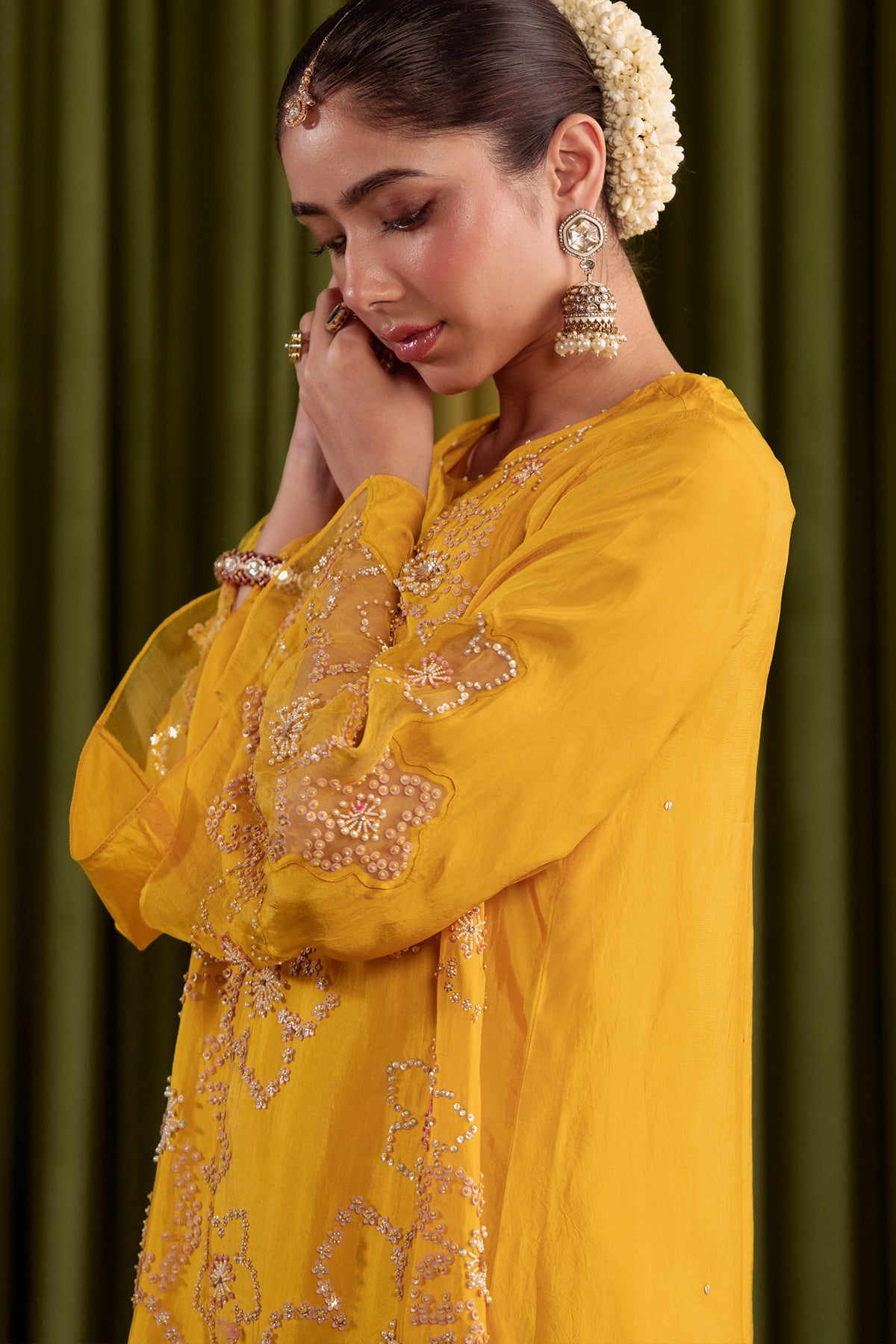 Golden Yellow Kurta set in viscose silk base with intricately hand embroidered yoke and booti design.