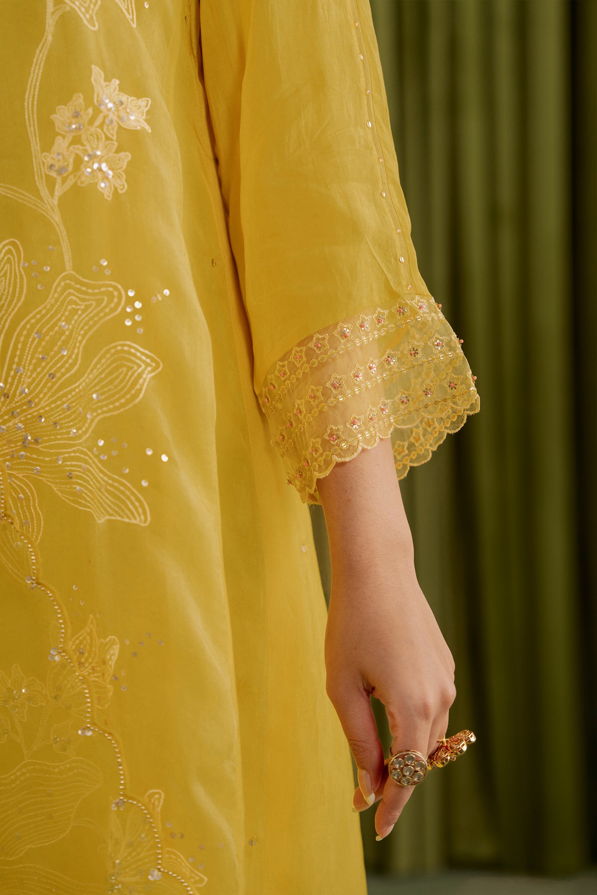 Mango kurta set with delicate floral embroidery.