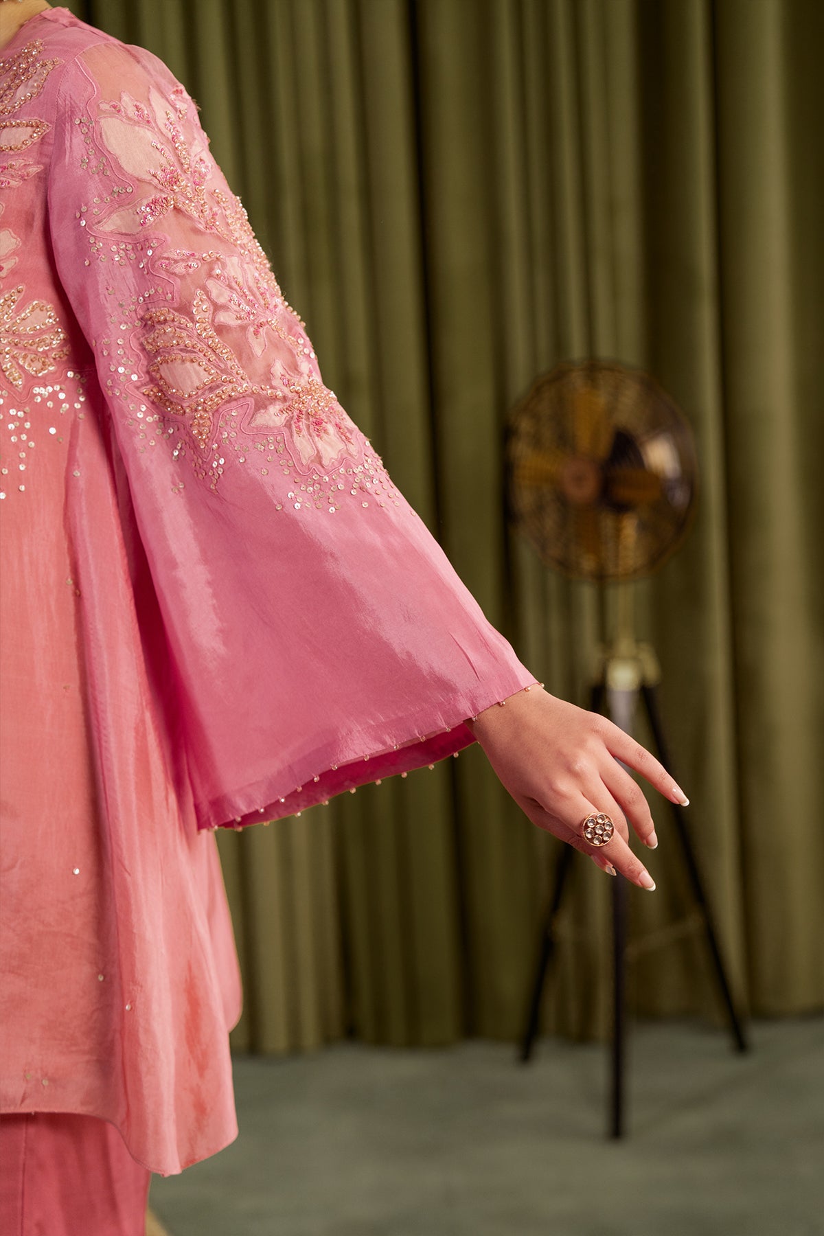 Rose pink co-ord set with embroidered magnolia flower pattern.