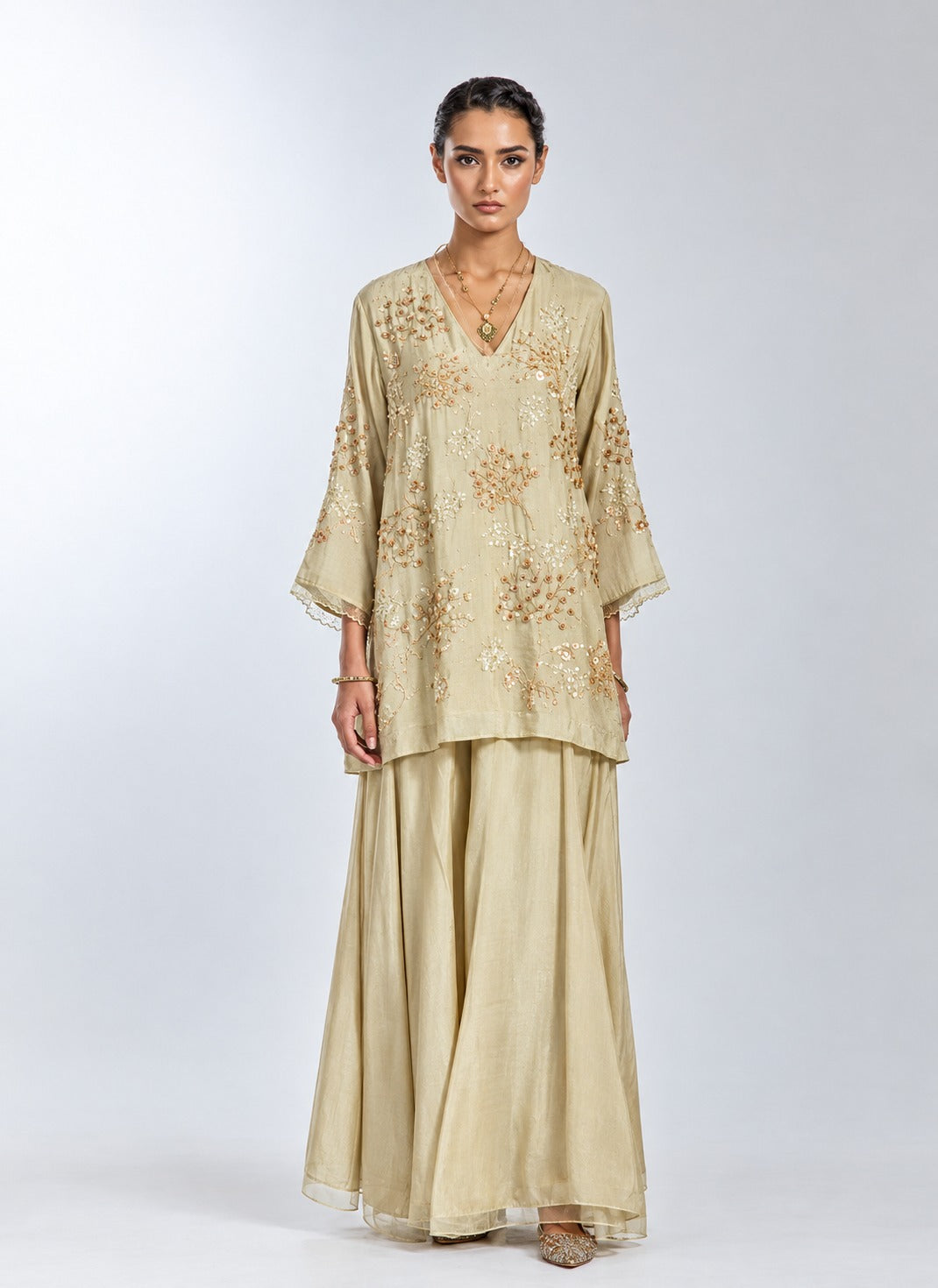 Silver silk sharara set with intricate floral hand embroidery