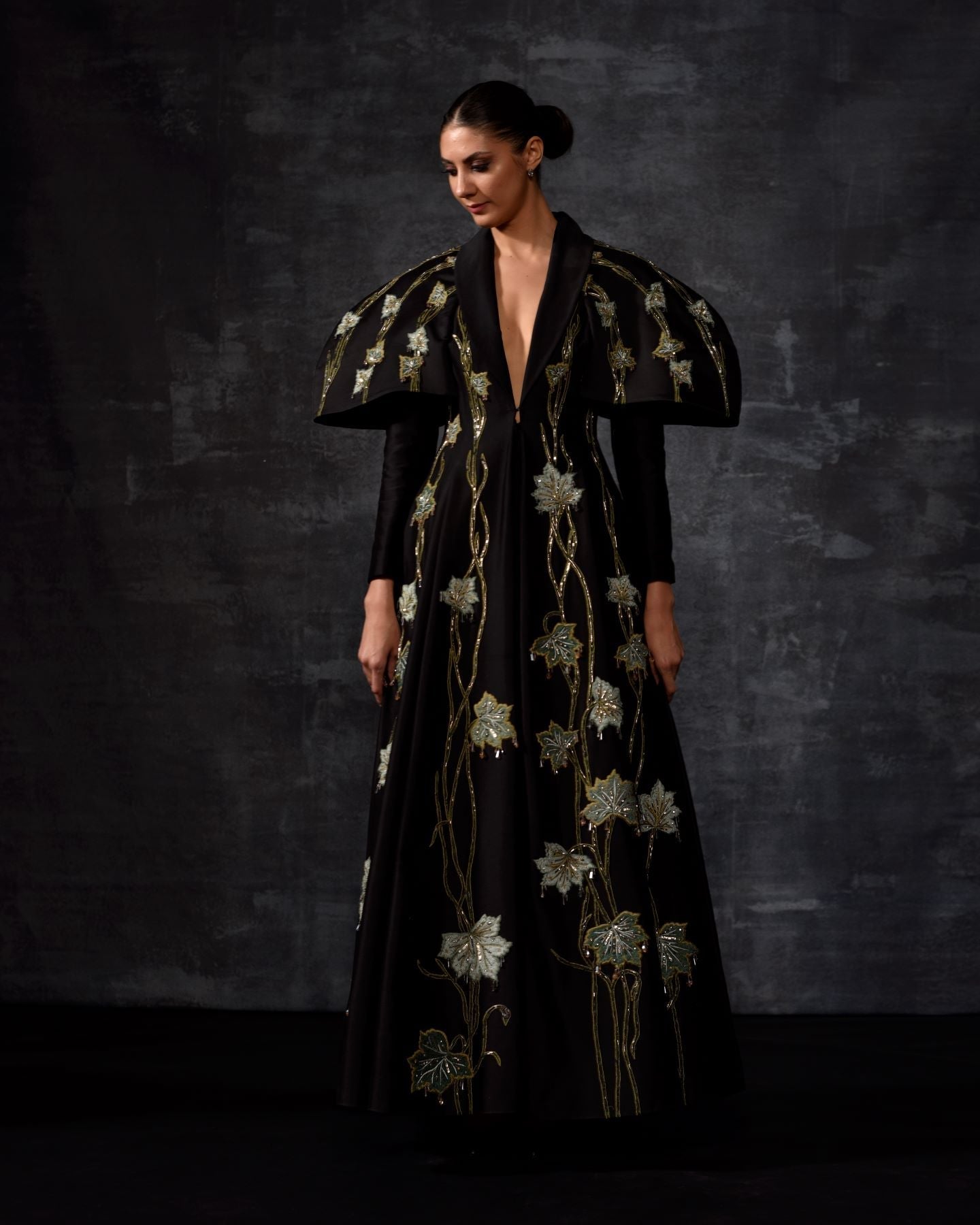 https://cdn.shopify.com/s/files/1/0088/3441/6706/files/a-black-cotton-silk-fabric-floor-length-gown-with-lapel-neck-line-2149919.jpg?v=1752388639