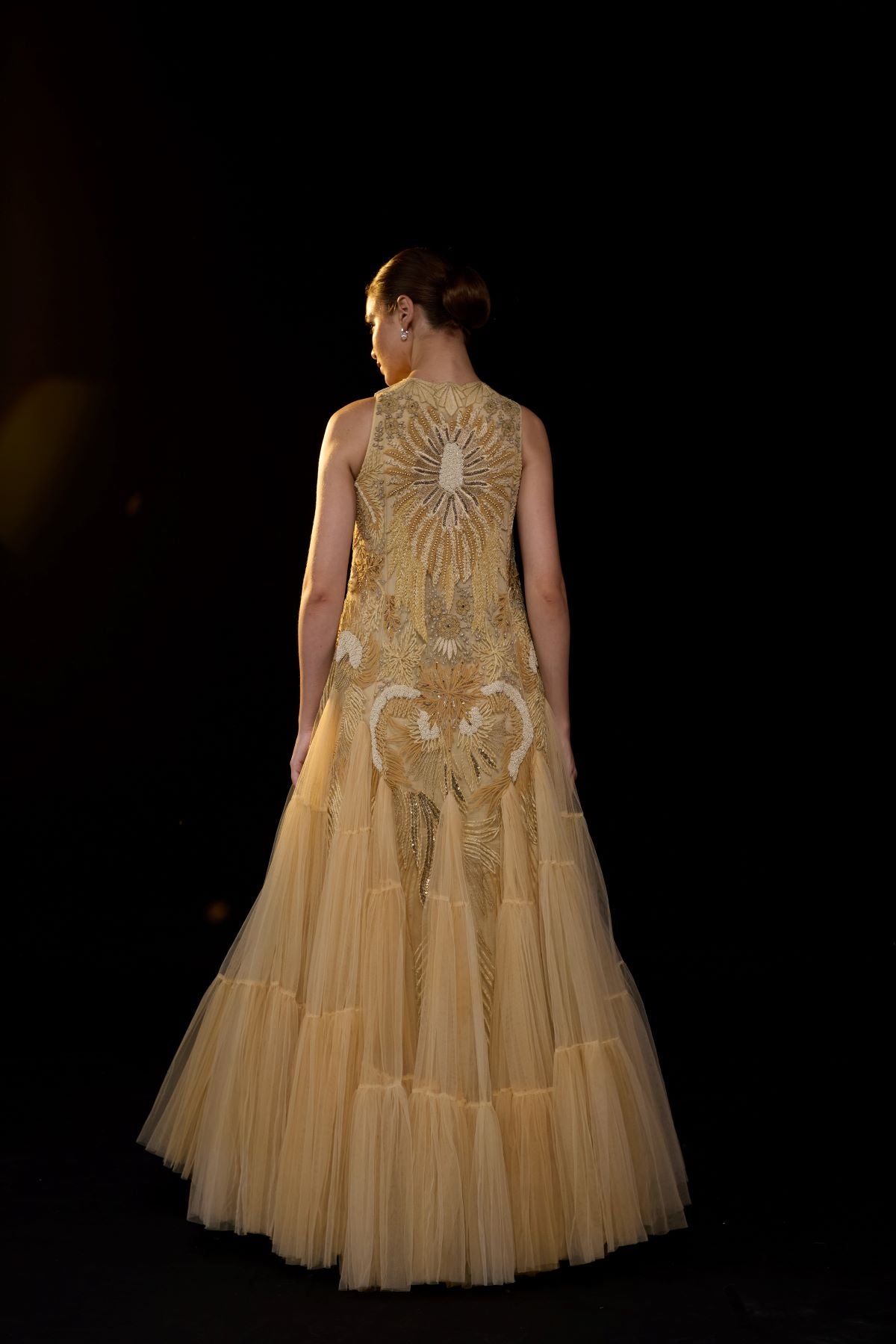 https://cdn.shopify.com/s/files/1/0088/3441/6706/files/a-ethereal-beige-gown-features-a-sleeveless-tier-ghera-1138138.jpg?v=1752388530