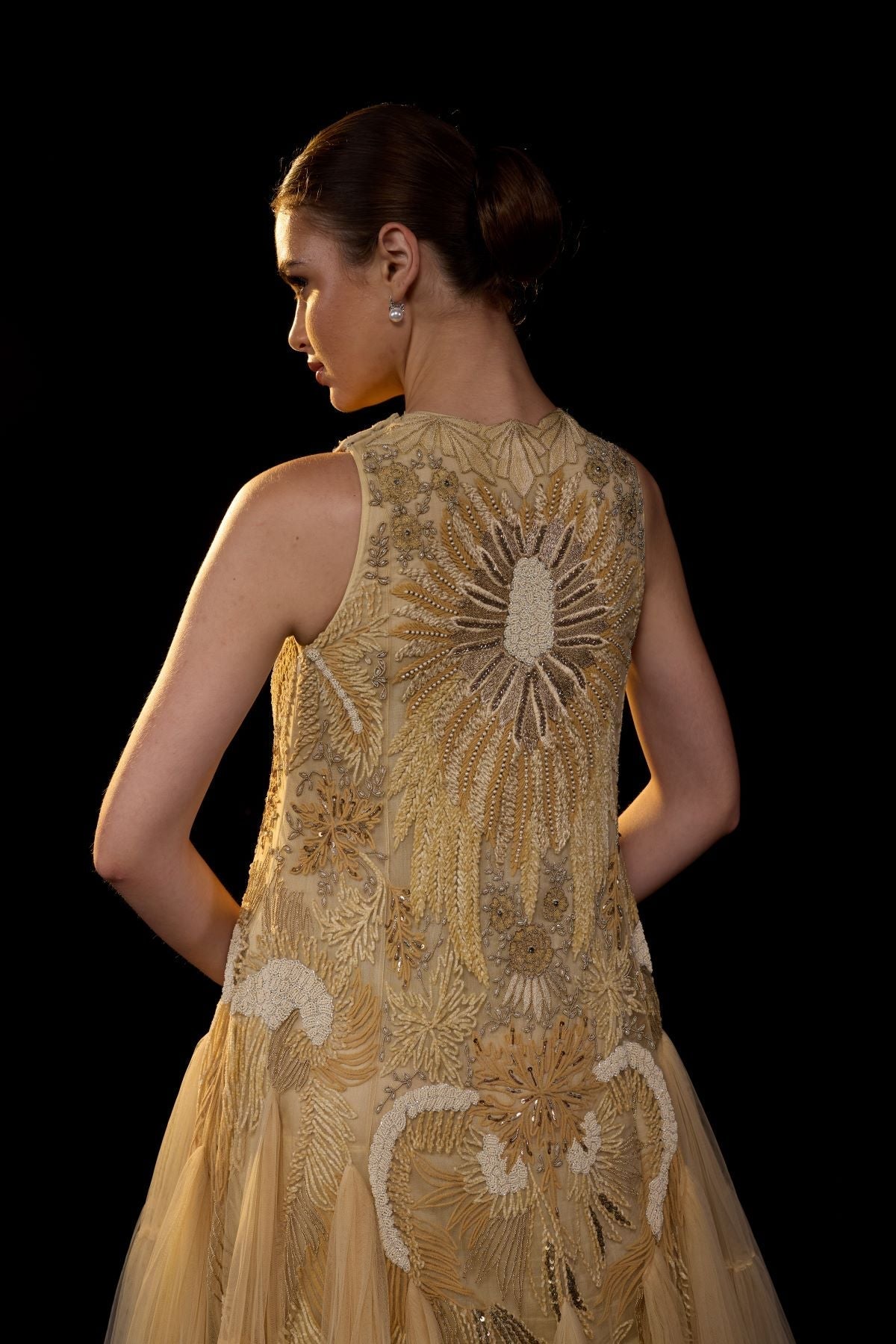 https://cdn.shopify.com/s/files/1/0088/3441/6706/files/a-ethereal-beige-gown-features-a-sleeveless-tier-ghera-2807410.jpg?v=1752388531
