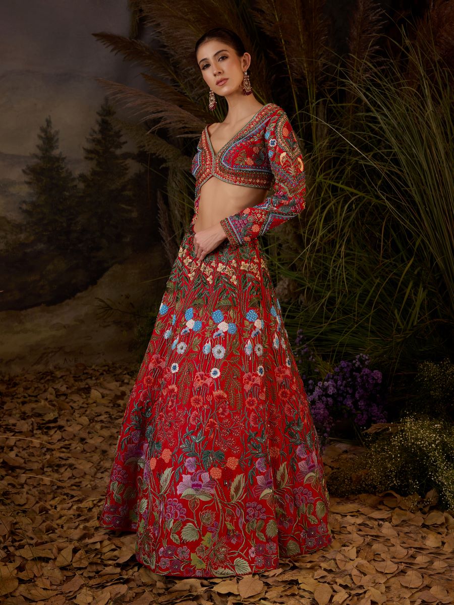 https://cdn.shopify.com/s/files/1/0088/3441/6706/files/a-red-organza-cotton-silk-lengha-with-v-neck-line-5815590.jpg?v=1752388669