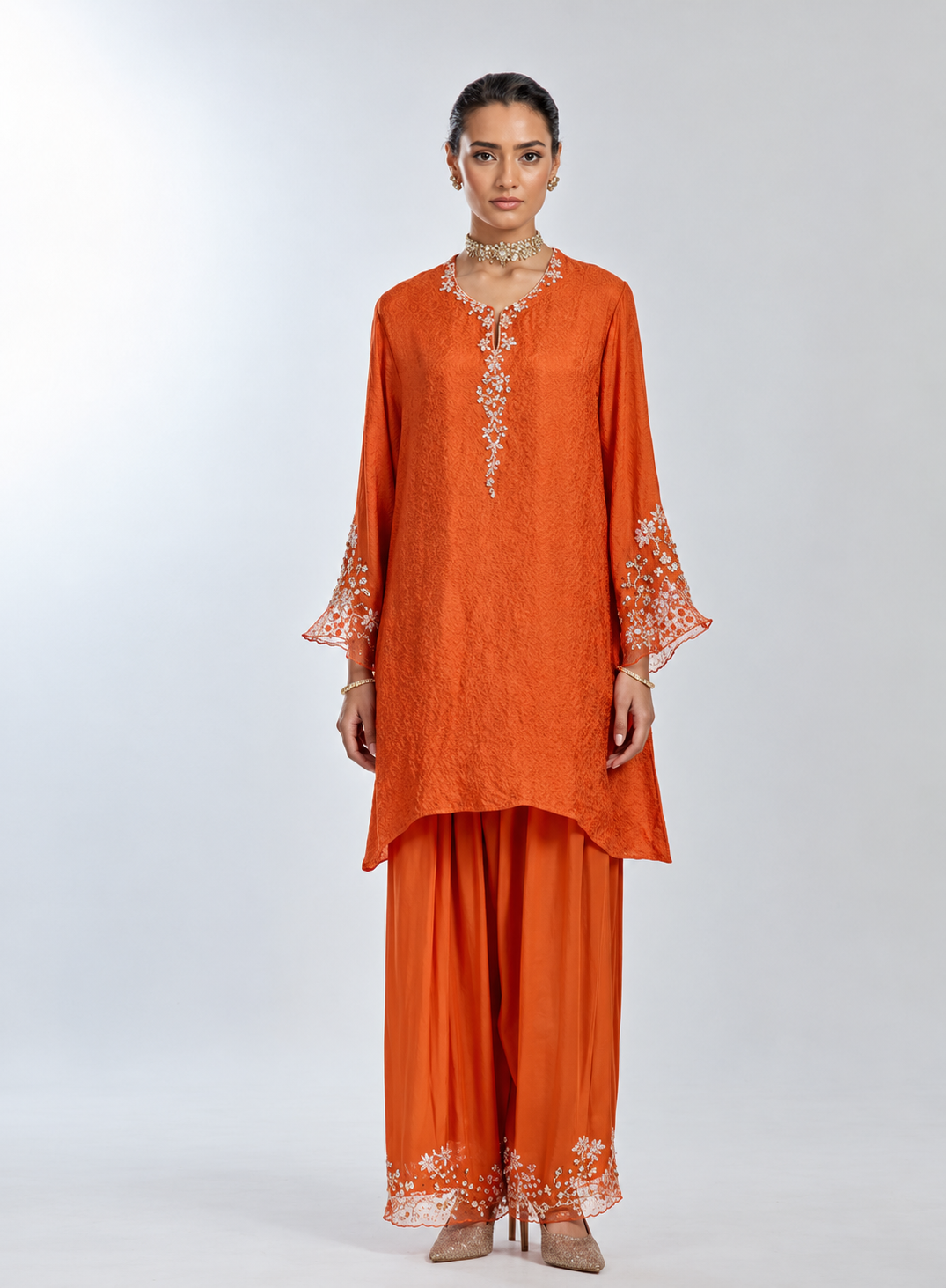 Poppy color salwar set in silk with floral hand embroidery