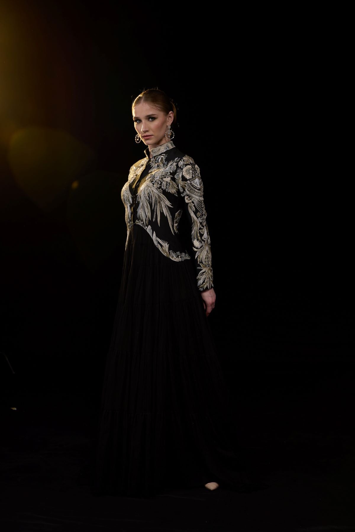https://cdn.shopify.com/s/files/1/0088/3441/6706/files/black-gown-with-metallic-gold-embroidery-3400455.jpg?v=1752388531