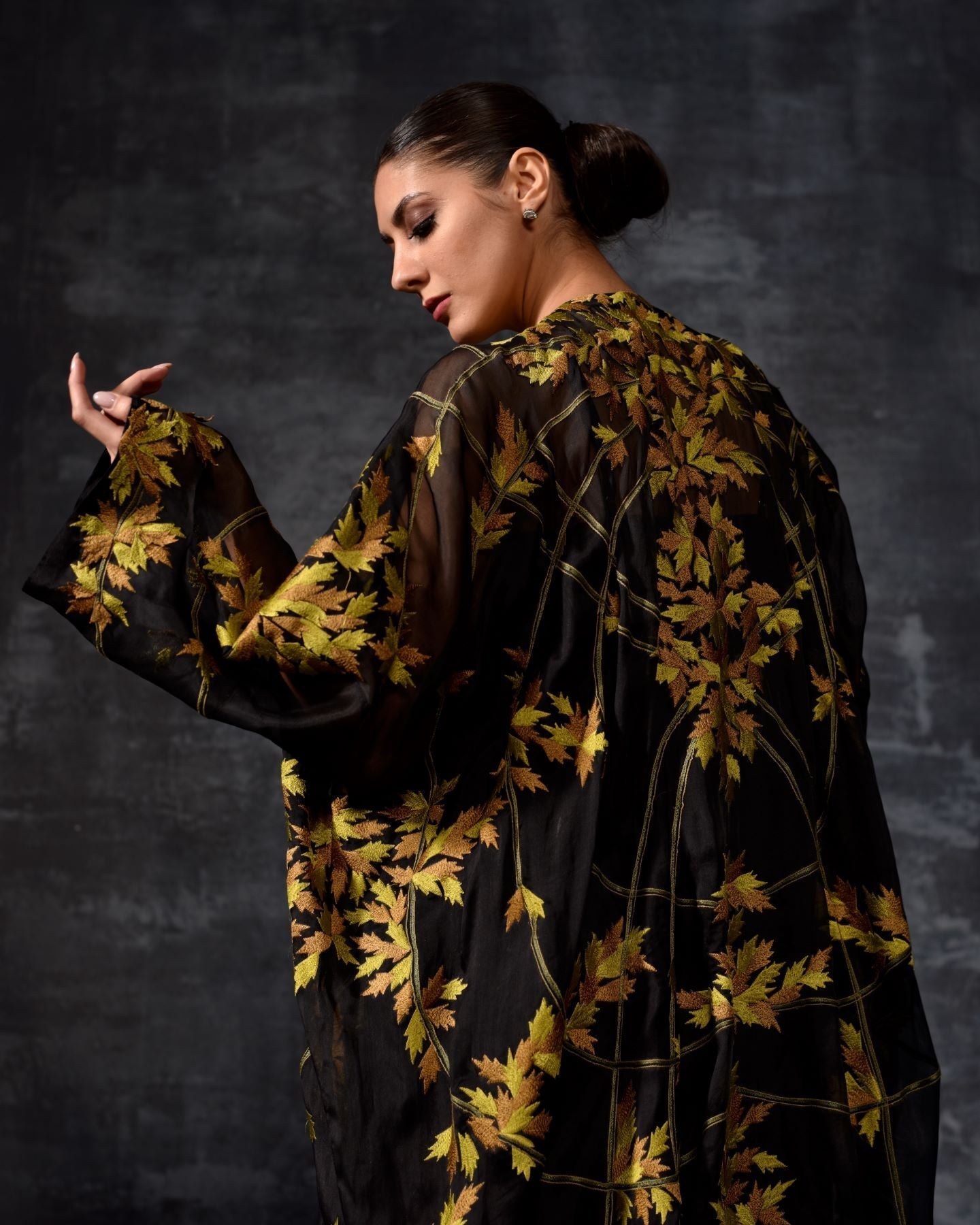 https://cdn.shopify.com/s/files/1/0088/3441/6706/files/black-yellow-embroidered-kaftan-7274794.jpg?v=1752388637