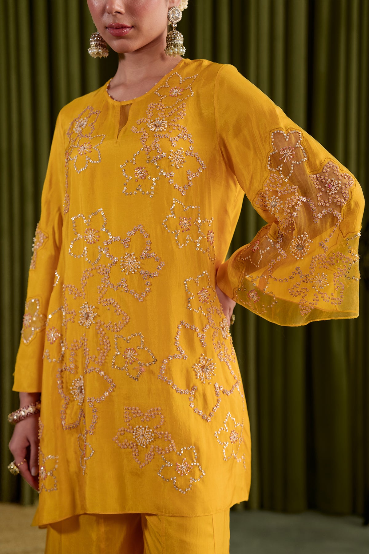 Golden Yellow Kurta set in viscose silk base with intricately hand embroidered yoke and booti design.
