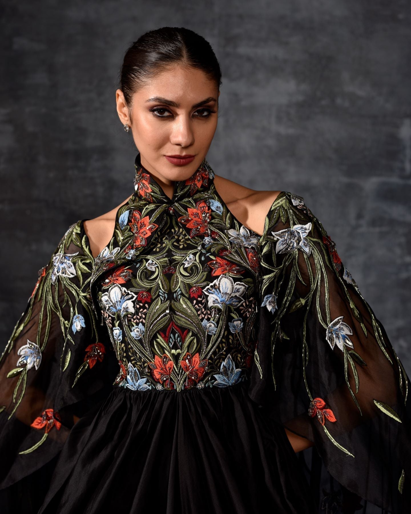 https://cdn.shopify.com/s/files/1/0088/3441/6706/files/dramatic-black-ensemble-gown-6341076.jpg?v=1752388638