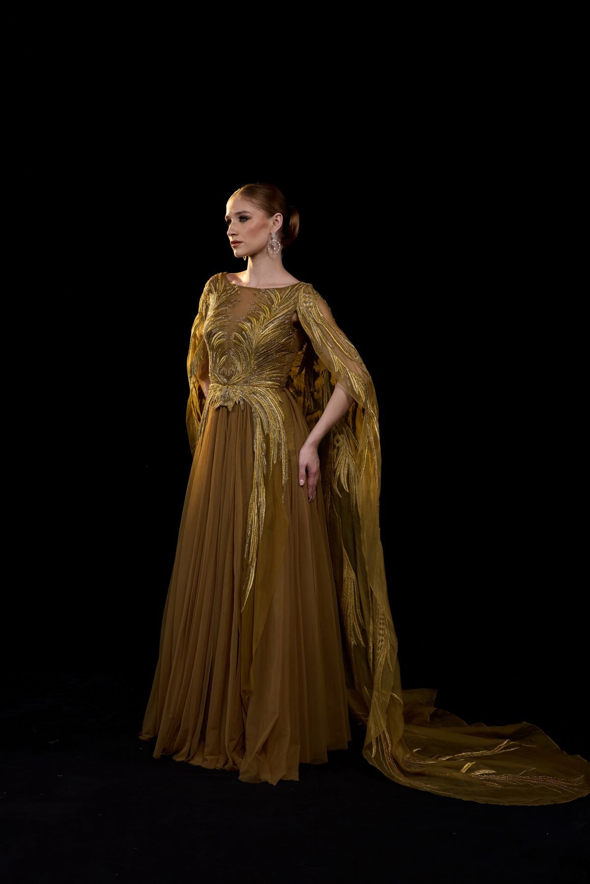 https://cdn.shopify.com/s/files/1/0088/3441/6706/files/golden-bronze-embroidered-gown-with-elegant-flowing-cape-sleeves-9302264.jpg?v=1752388530
