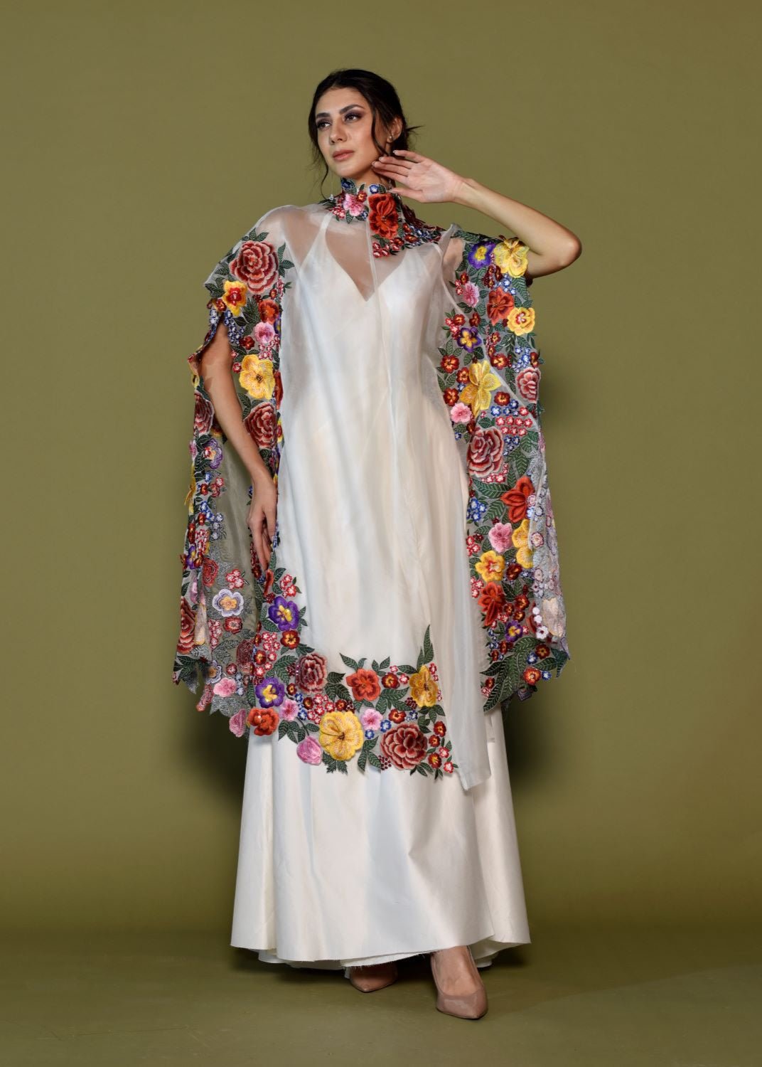 https://cdn.shopify.com/s/files/1/0088/3441/6706/files/ivory-silk-gown-with-bold-floral-embroidered-cape-2417017.jpg?v=1752388606