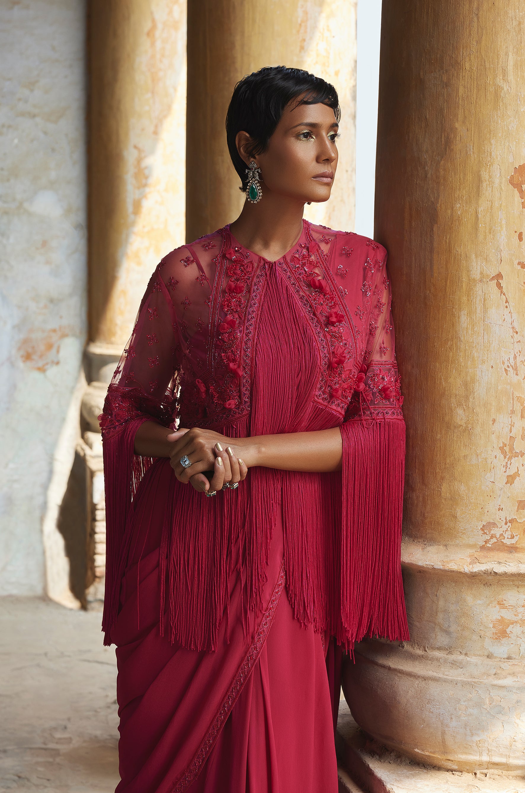 Fuchsia georgette saree with an embroidered fringed cape