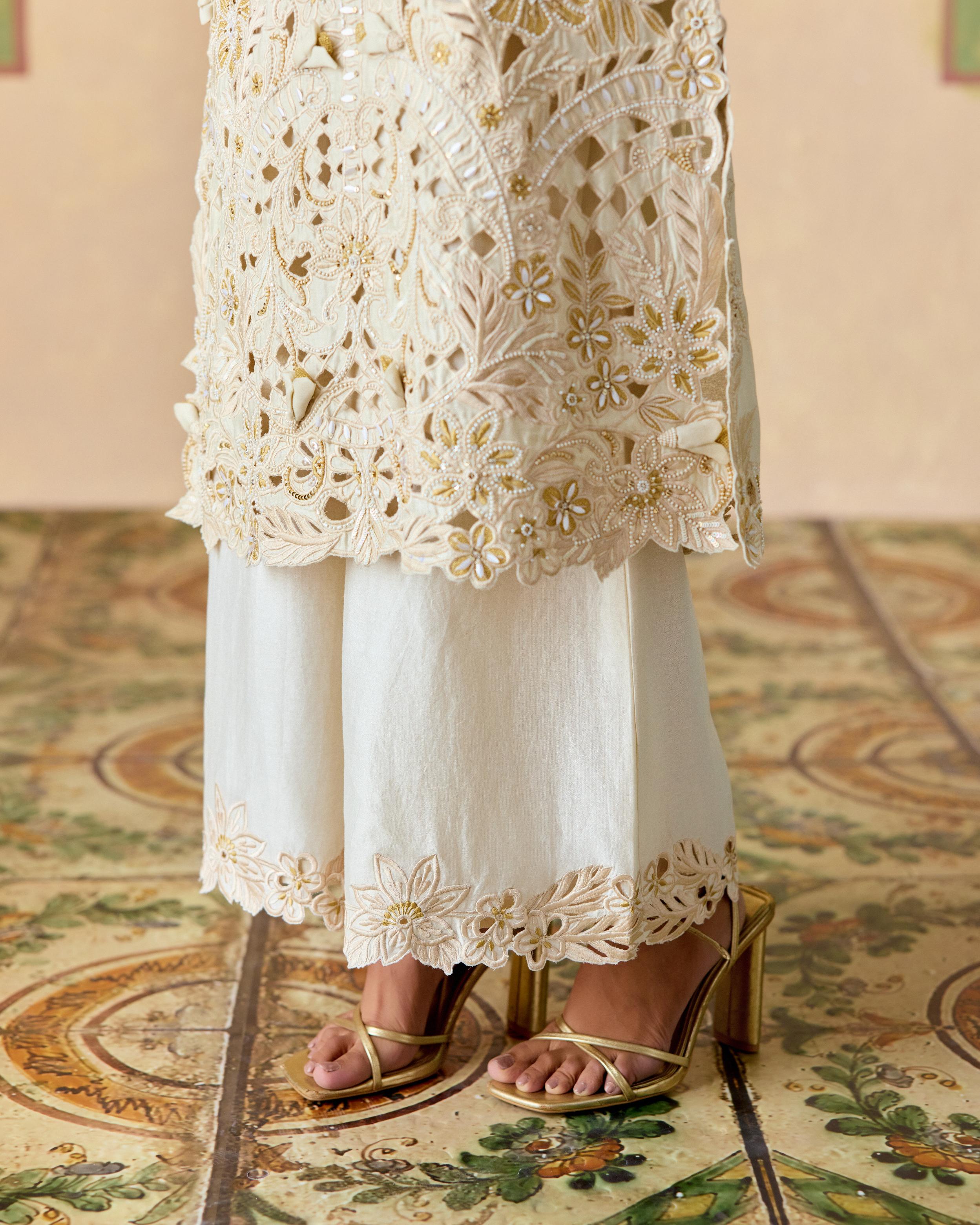 IVORY AND GOLD CUTWORK KURTA WITH CUTWORK FLARED PANTS