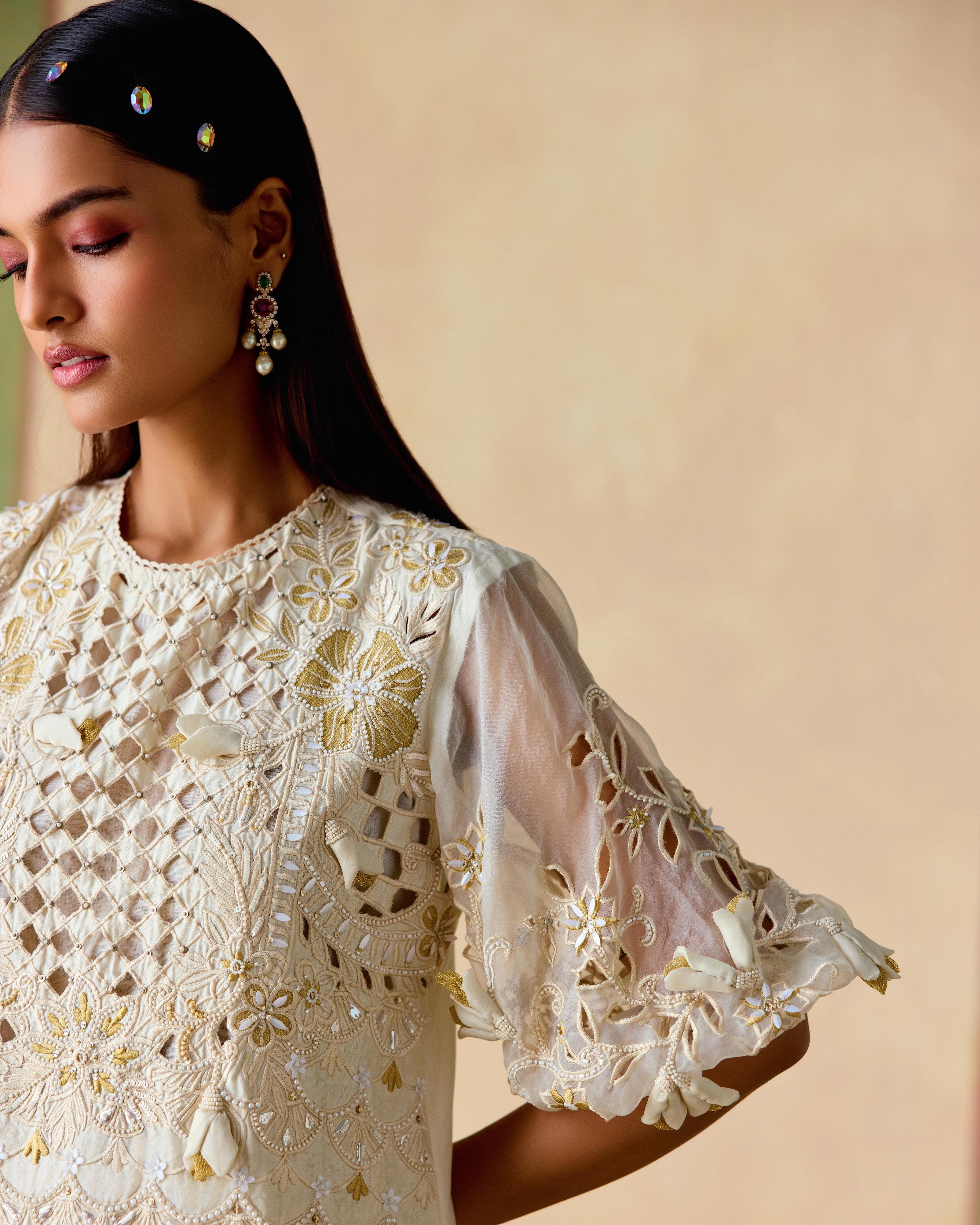 IVORY AND GOLD CUTWORK KURTA WITH CUTWORK FLARED PANTS