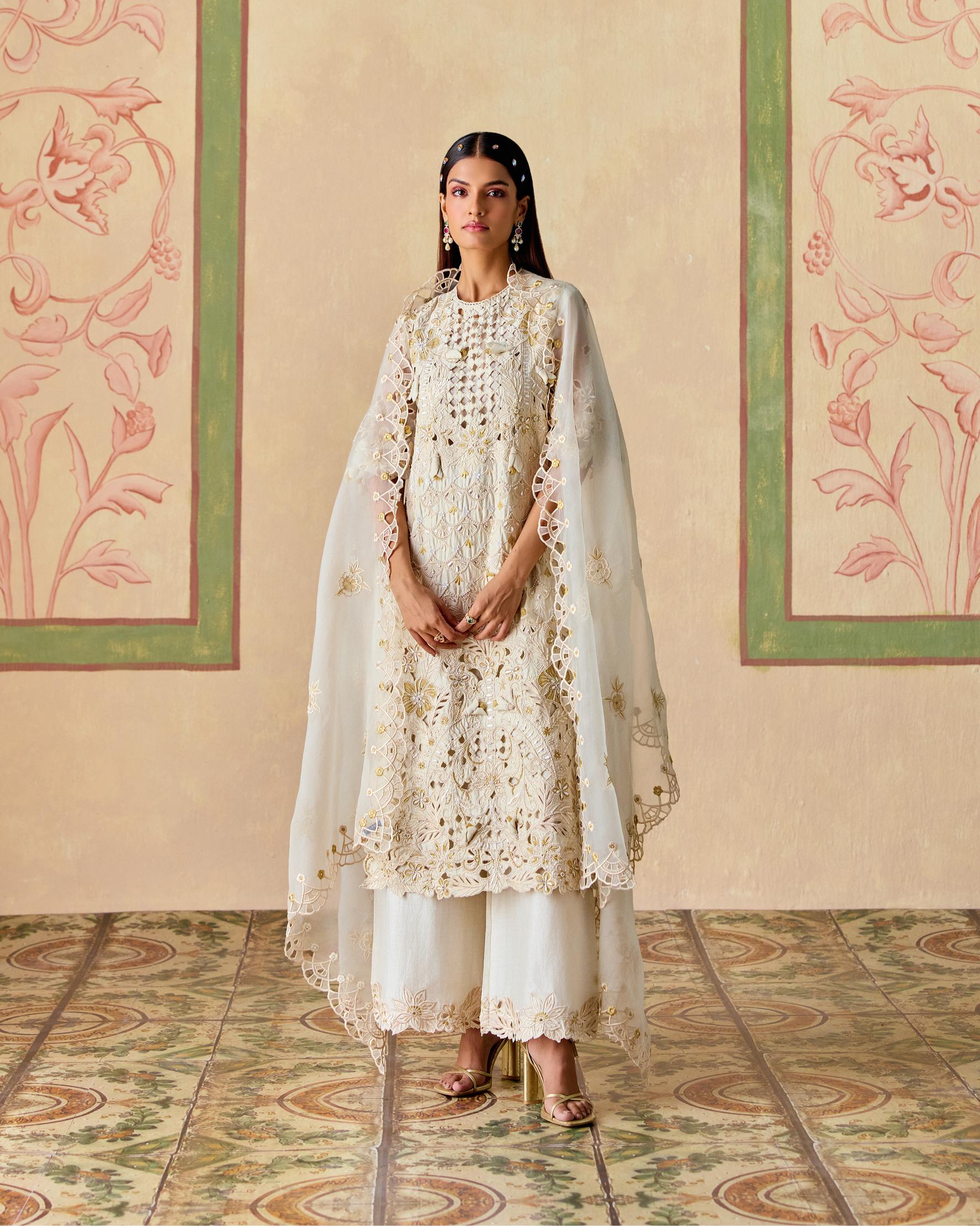 IVORY AND GOLD CUTWORK KURTA WITH CUTWORK FLARED PANTS