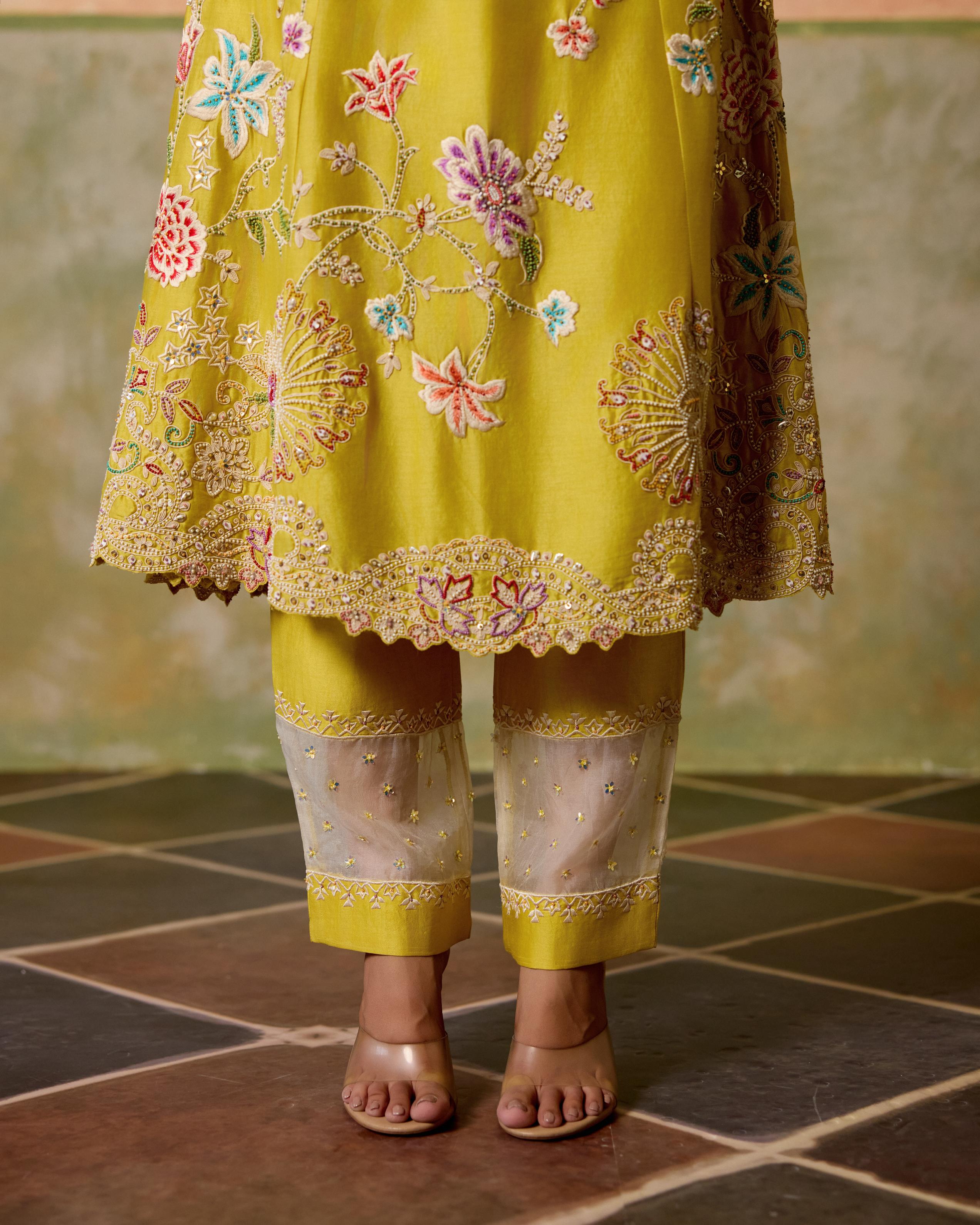 YELLOW CONTRAST CORDWORK FLARED LONG KURTA WITH SHEER PANEL PANTS