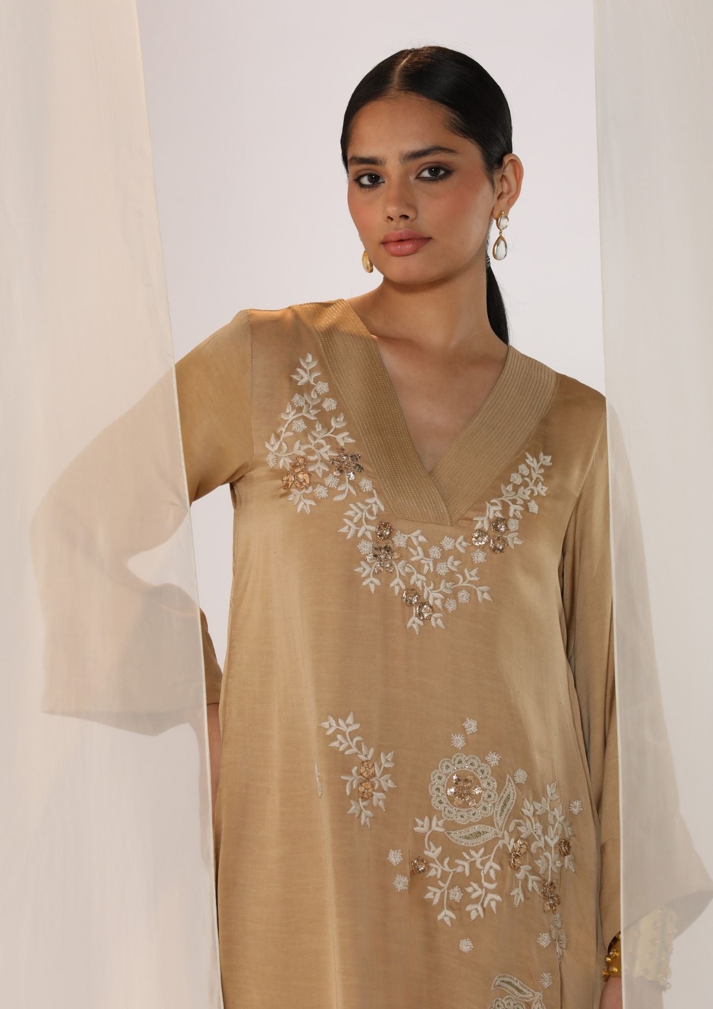 Linen satin V neck Kurta with scatter embroidary paired with slim pants