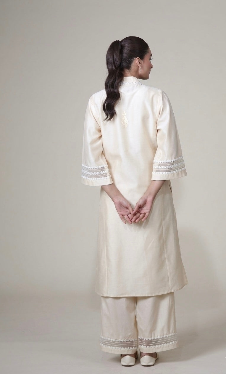 https://cdn.shopify.com/s/files/1/0585/9495/1341/files/Ambreen_ivory_back_jpg.jpg?v=1773037190