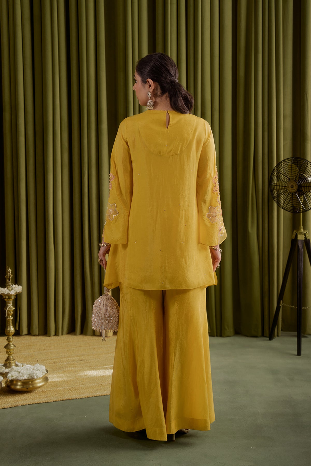 Mango sharara set with hand embroidered floral pattern.