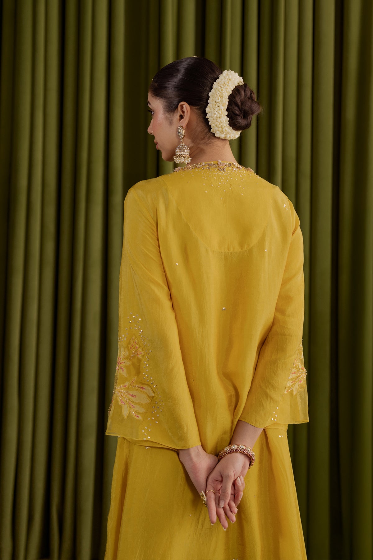 Mango kurta set in viscose silk base with embroidered magnolia flower pattern.