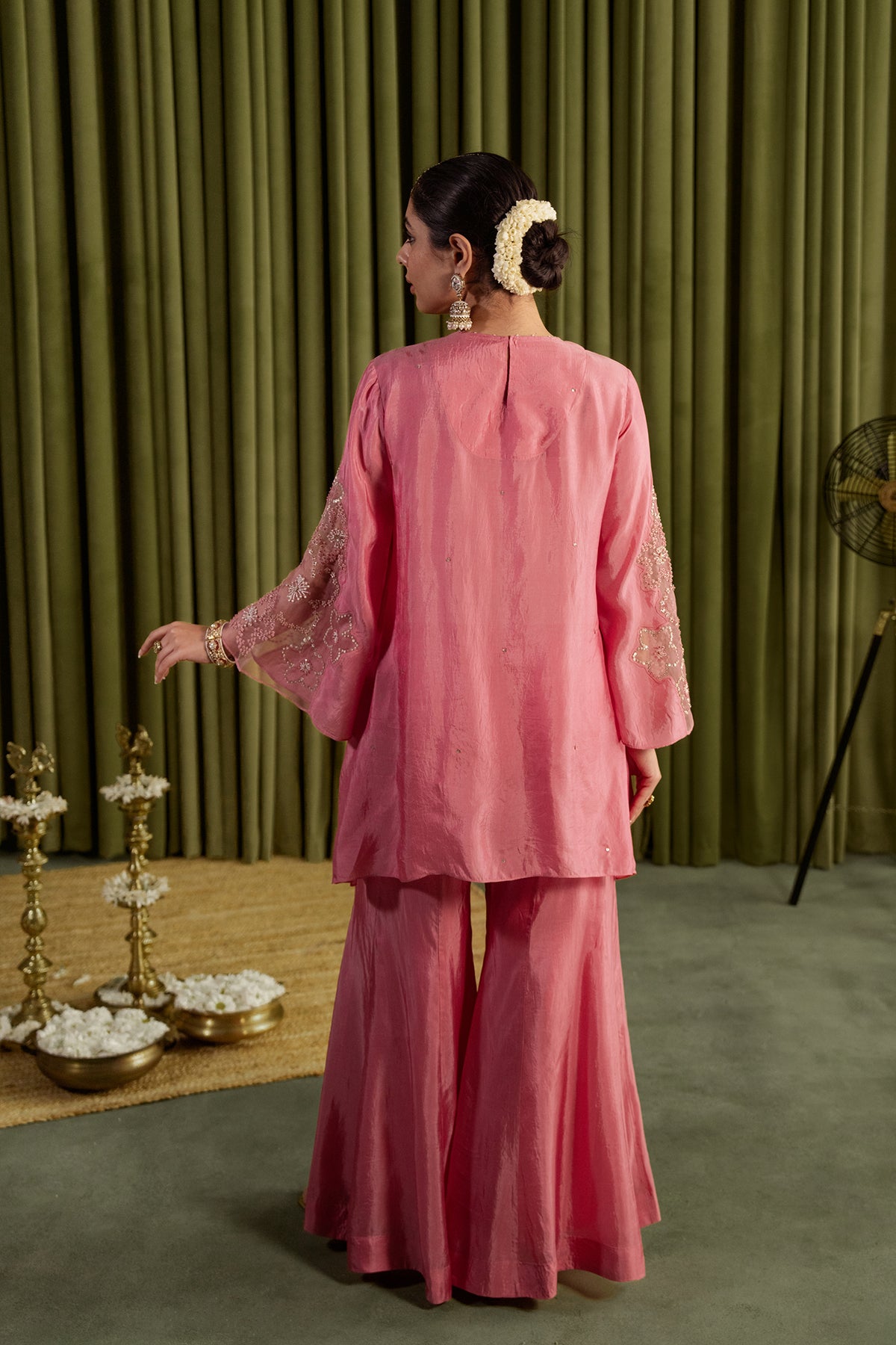 Rose pink sharara set with hand embroidered floral pattern.