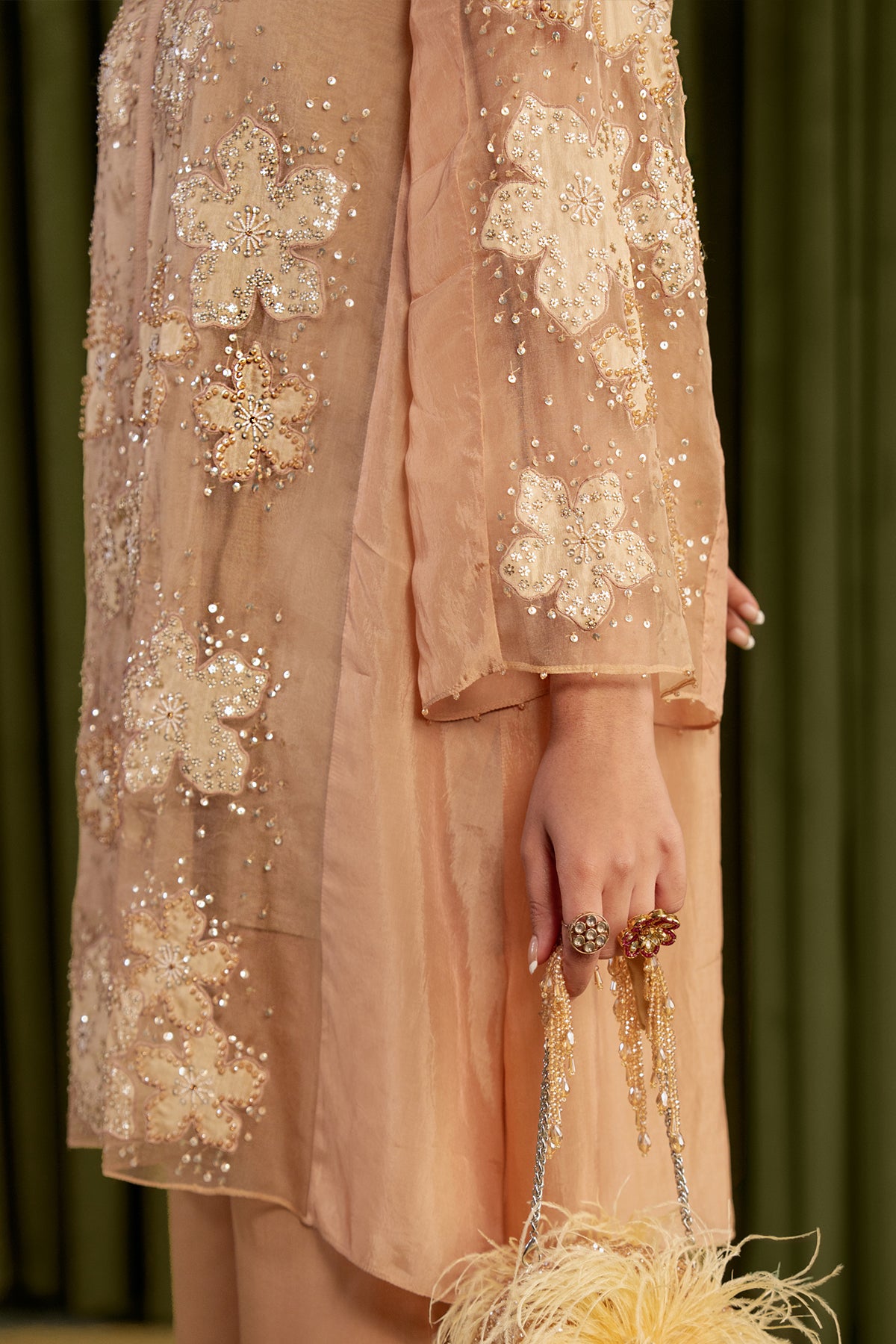 Golden beige co-ord set with embroidered floral pattern.