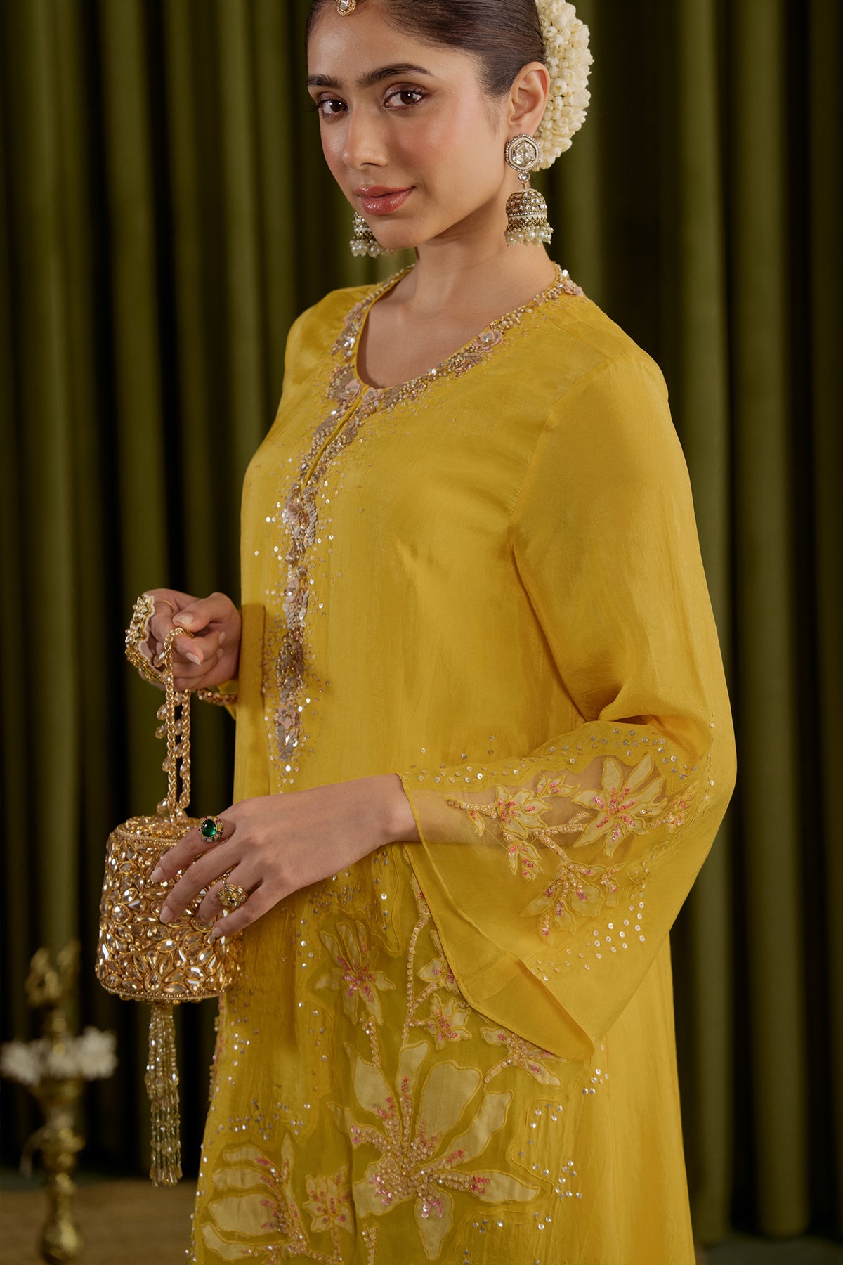 Mango kurta set in viscose silk base with embroidered magnolia flower pattern.