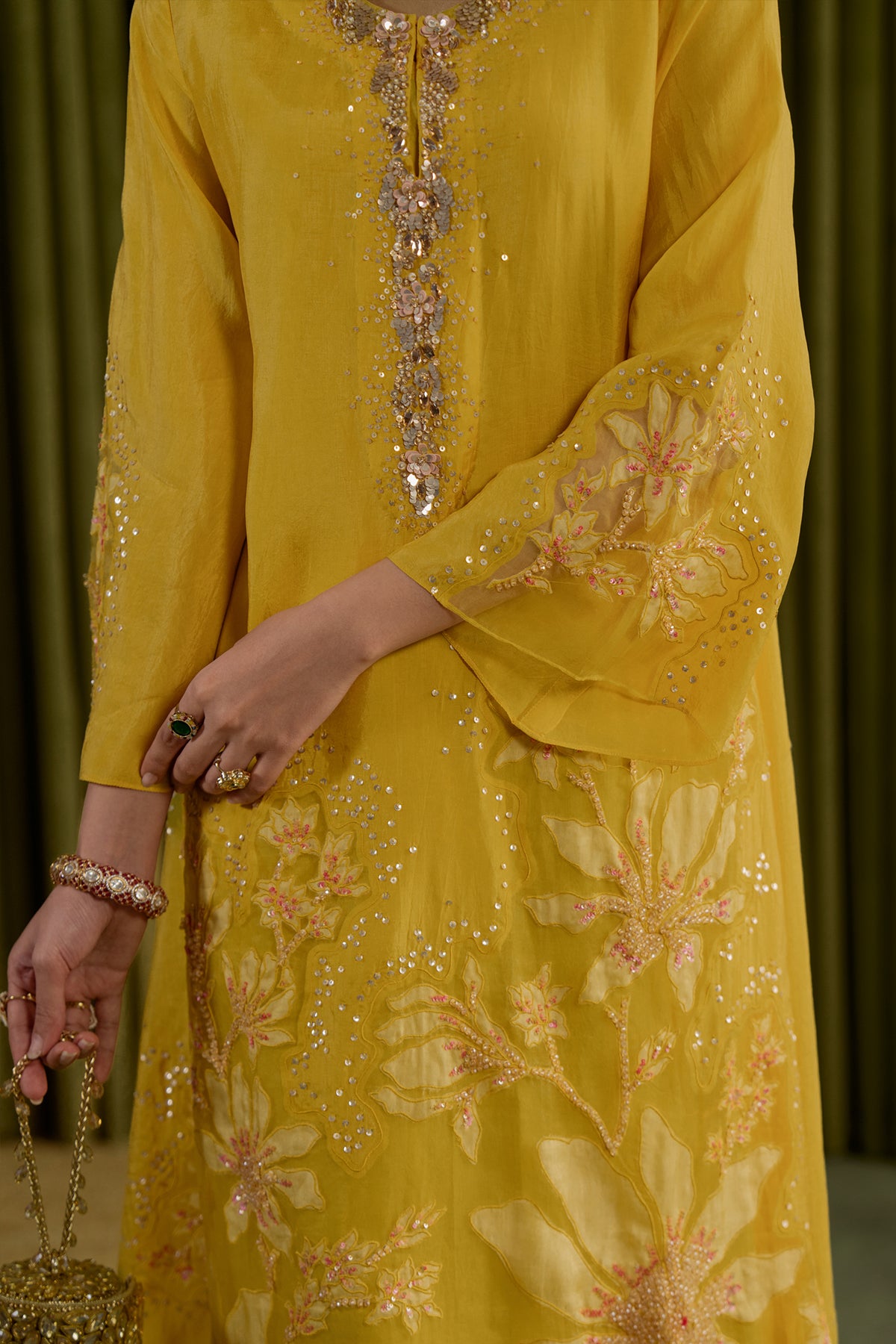 Mango kurta set in viscose silk base with embroidered magnolia flower pattern.
