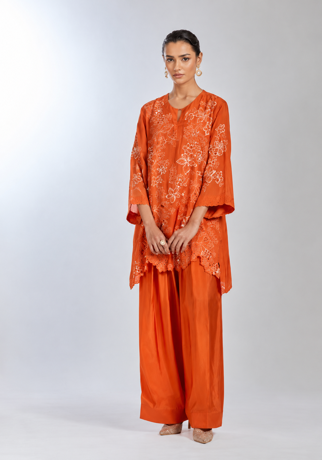 Poppy color silkn salwar set with floral cutwork