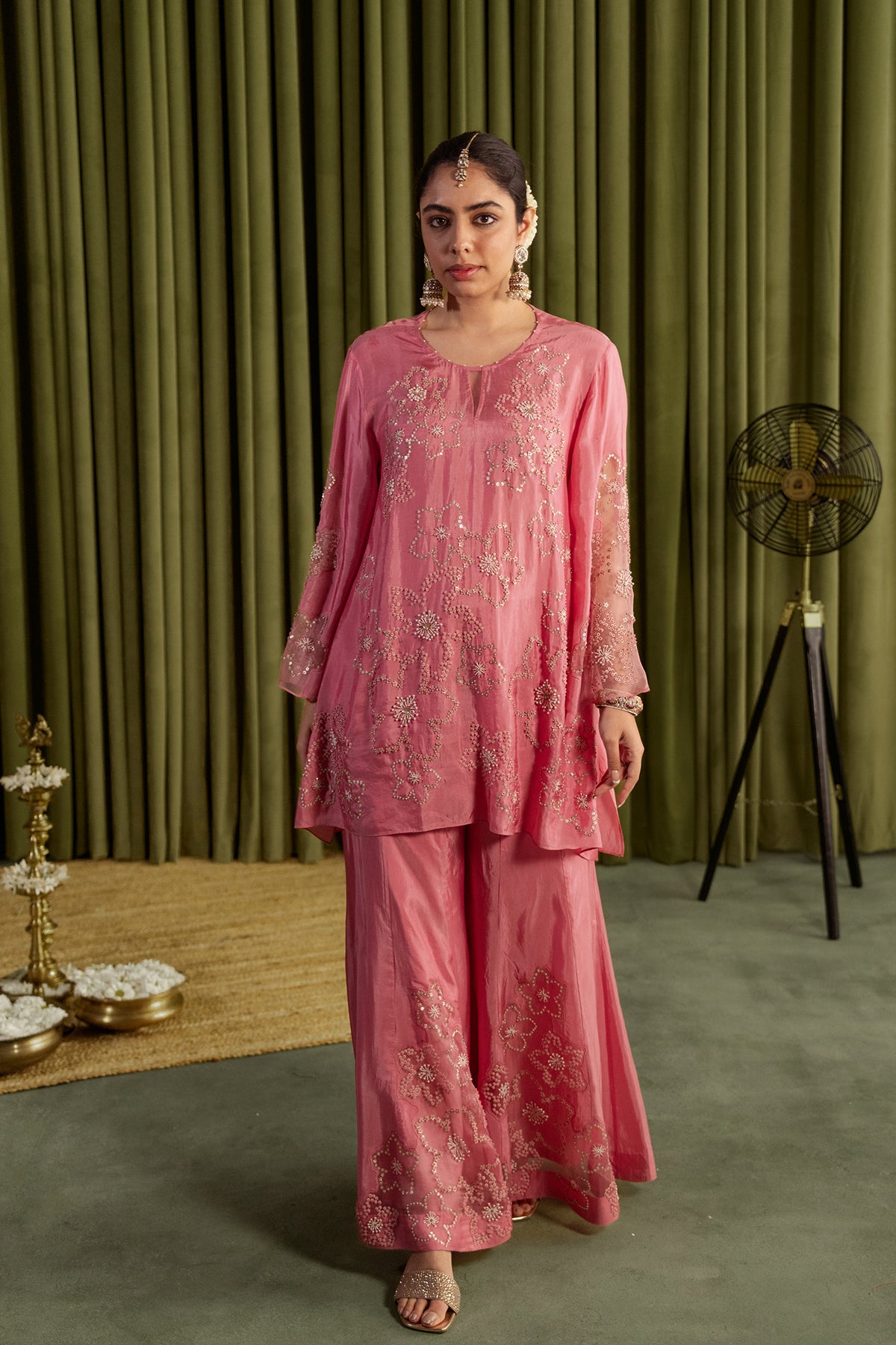 Rose pink sharara set with hand embroidered floral pattern.
