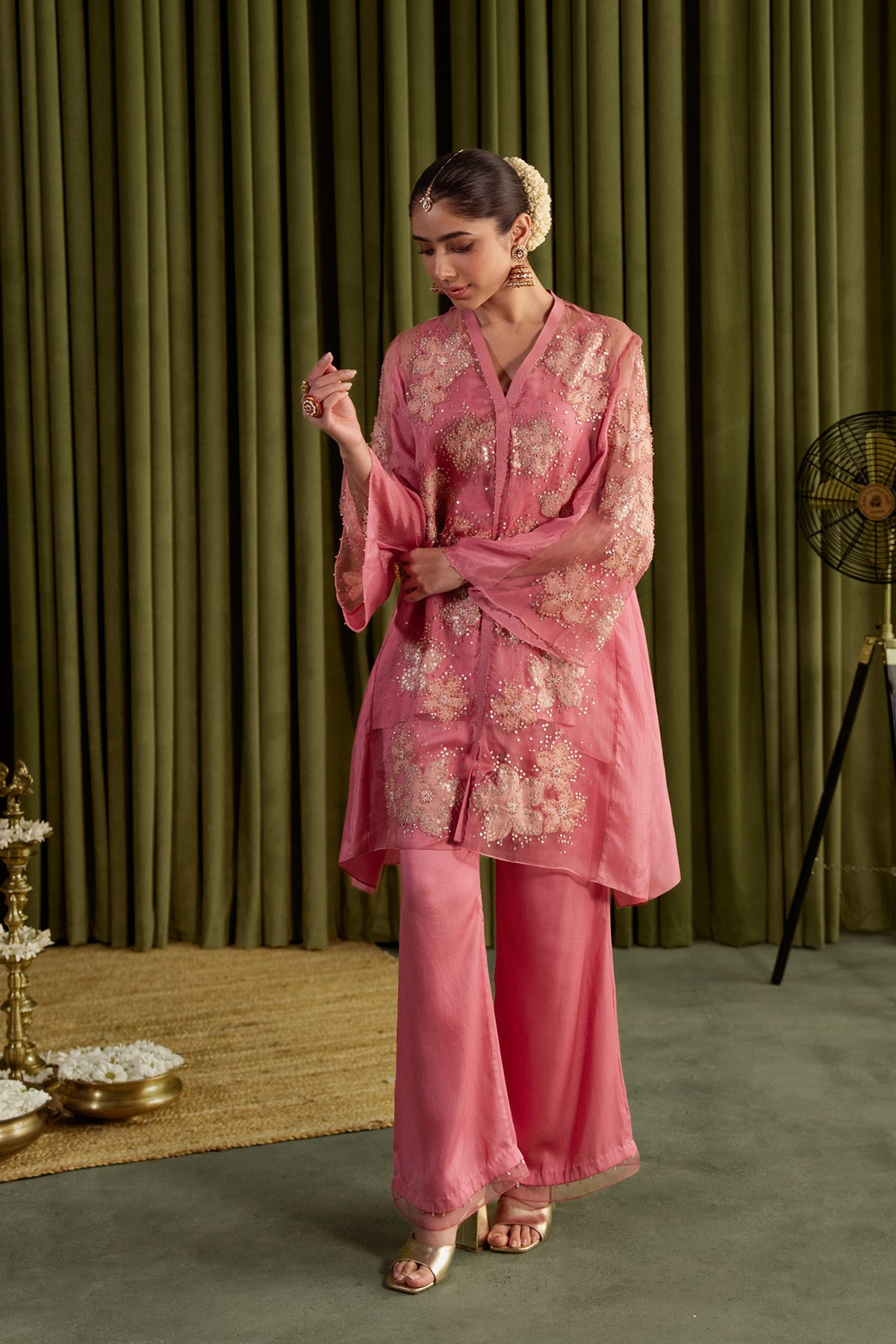 Rose pink co-ord set with embroidered floral pattern.