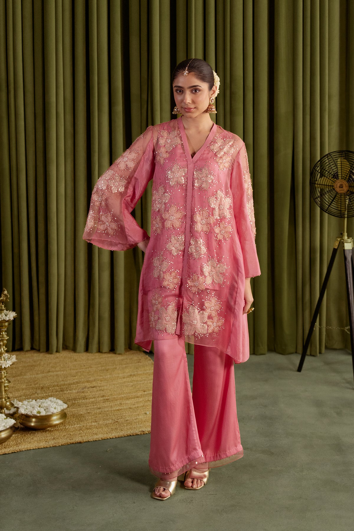 Rose pink co-ord set with embroidered floral pattern.