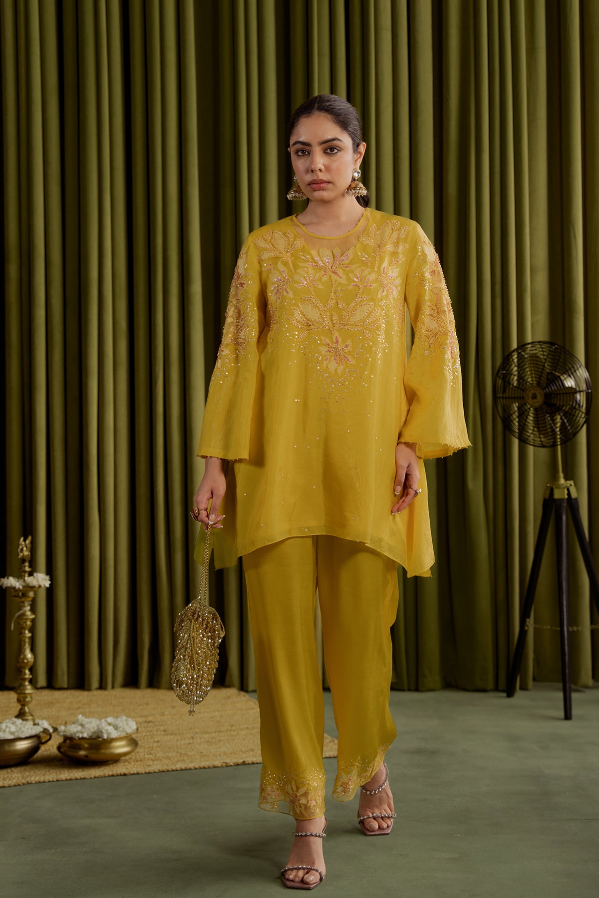 Mango co-ord set with embroidered magnolia flower pattern.