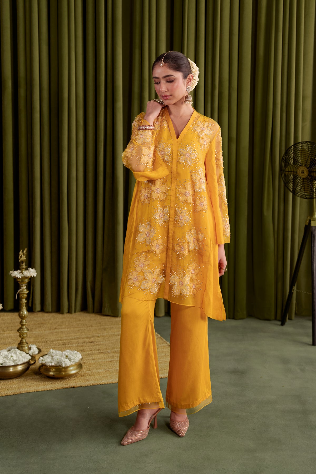 Golden beige co-ord set with embroidered floral pattern.