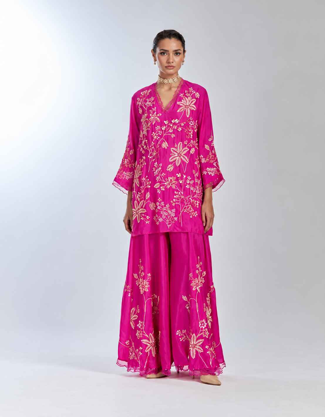 Hot pink color silk sharara set with intricate floral hand embroidery