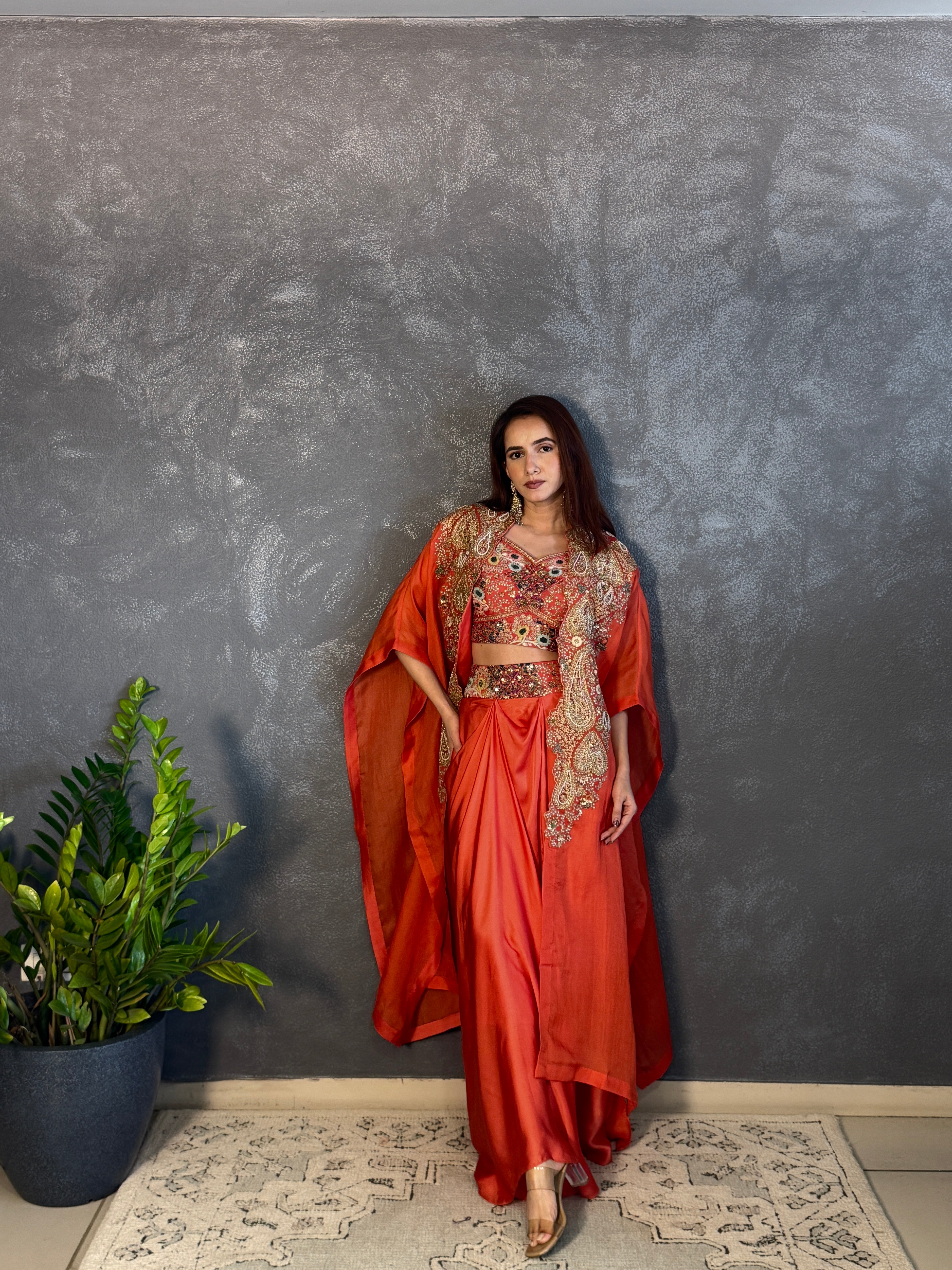 Gulrez cape with embroidered bustier & draped skirt
