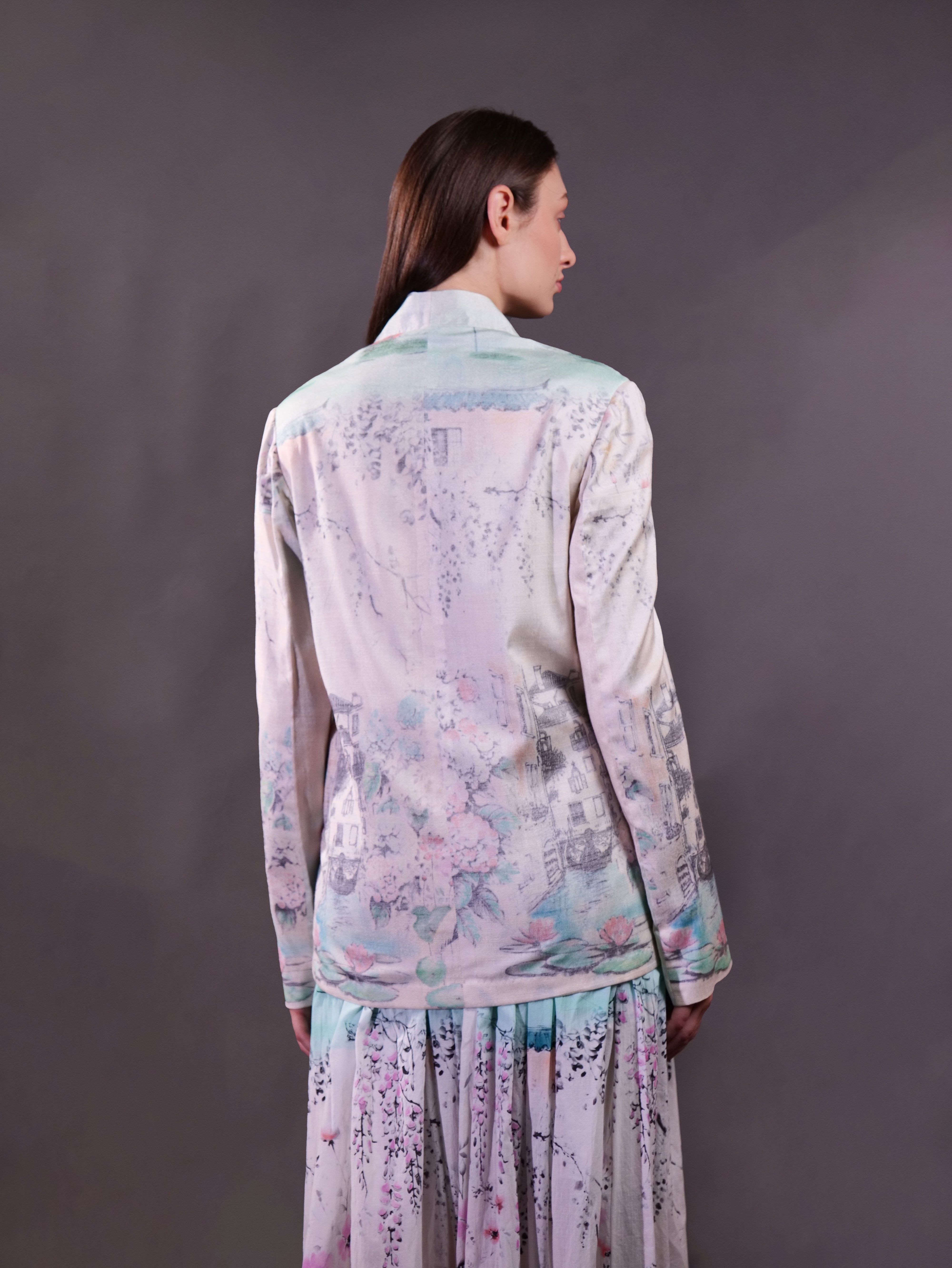 Matka Silk Printed Jacket wth embroidery highlight paired with printed cotton skirt
