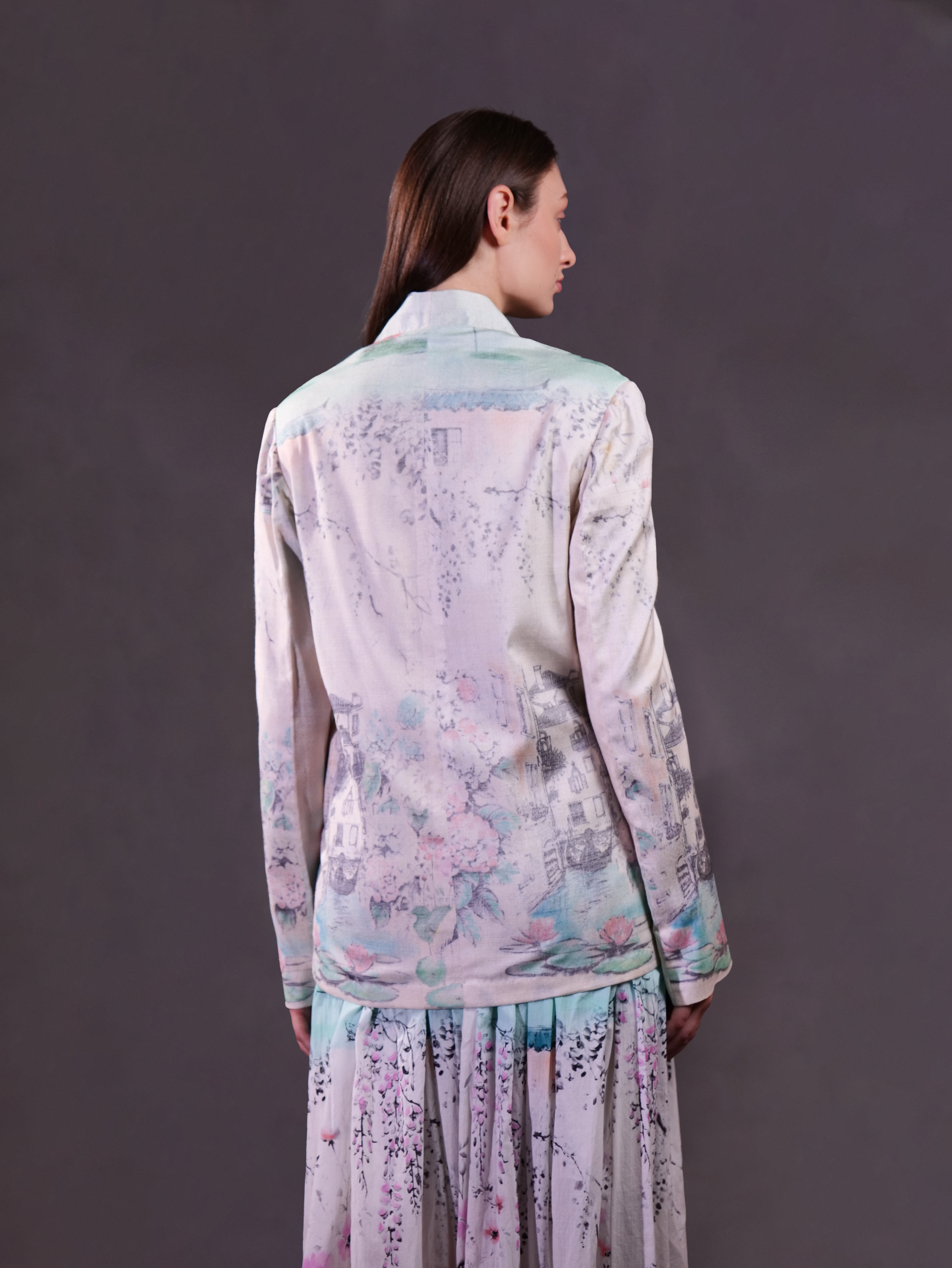 Matka Silk Printed Jacket wth embroidery highlight paired with printed cotton skirt