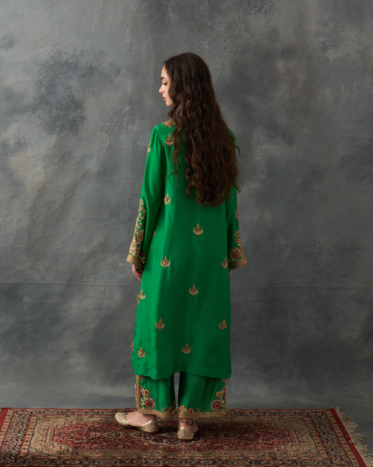 Gulrez Knee length kurta set with emboidered pants.