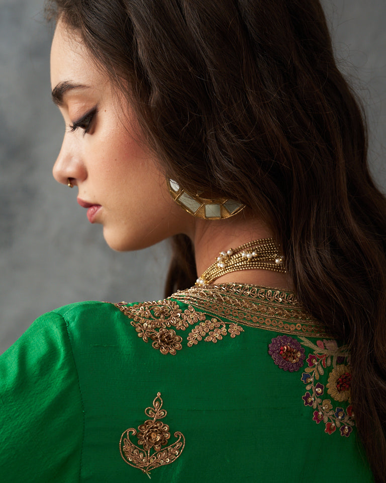 Gulrez Knee length kurta set with emboidered pants.