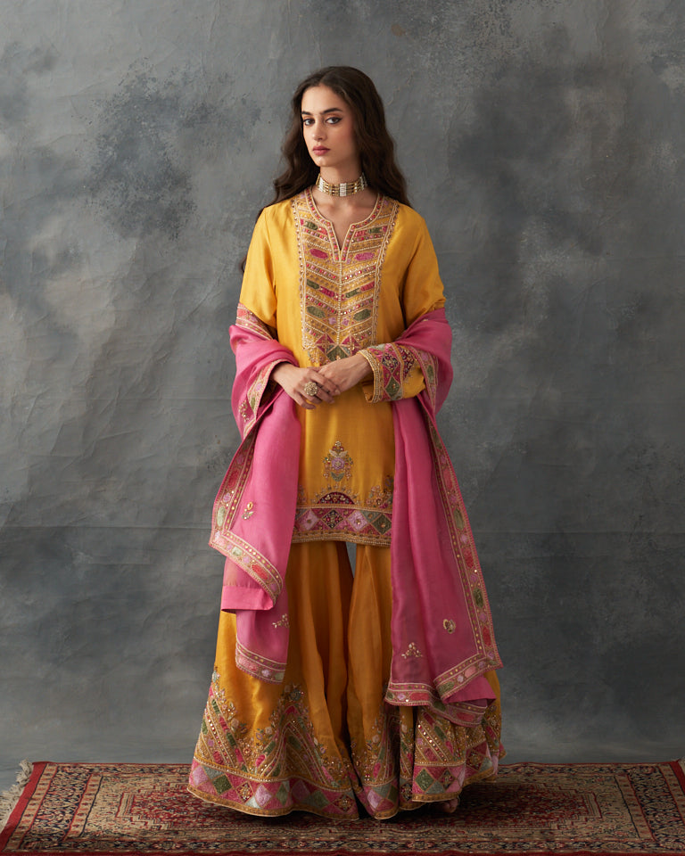 Velvet patchwork short kurta with Sharara pants & dupatta.