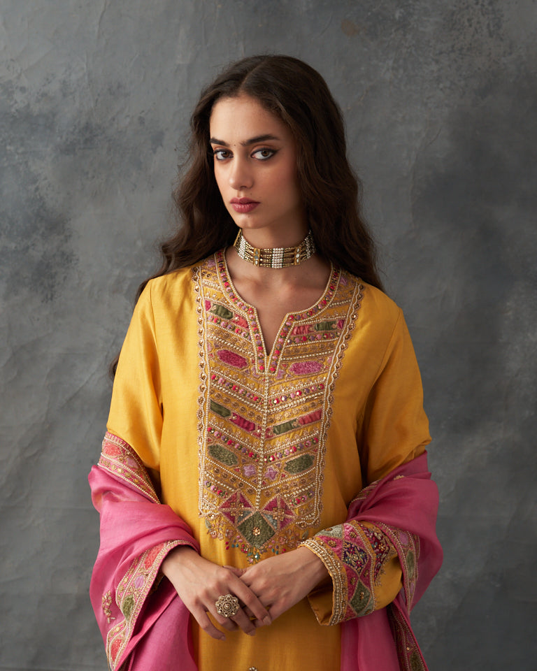 Velvet patchwork short kurta with Sharara pants & dupatta.