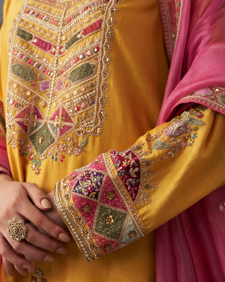 Velvet patchwork short kurta with Sharara pants & dupatta.