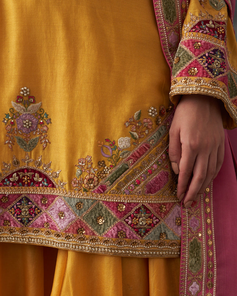 Velvet patchwork short kurta with Sharara pants & dupatta.