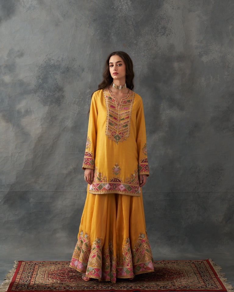 Velvet patchwork short kurta with Sharara pants & dupatta.