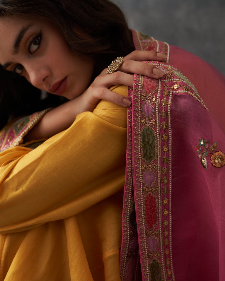 Velvet patchwork short kurta with Sharara pants & dupatta.