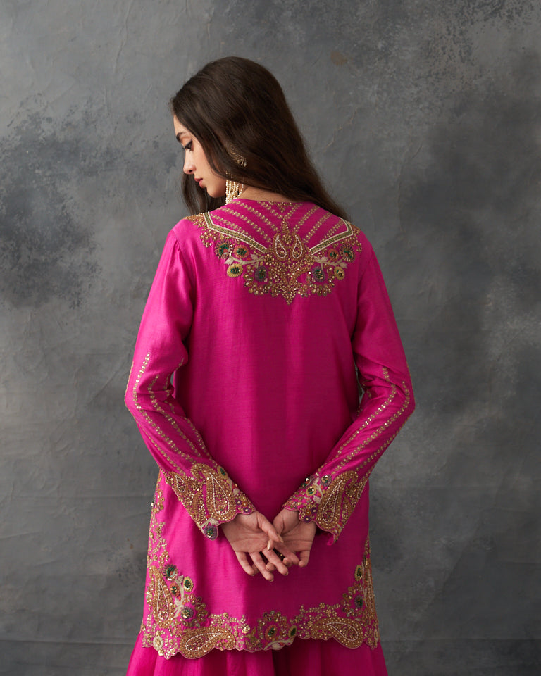 Gulrez short kurti with sharara & dupatta.